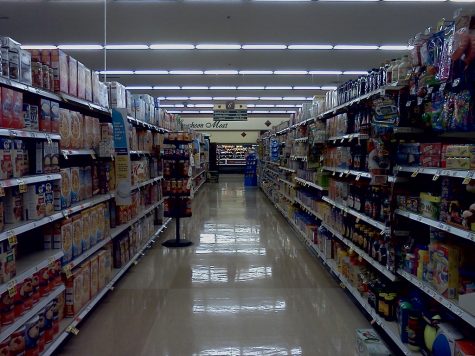 Pictured above is a deserted aisle within a dim grocery store. Photo credits to Creative Commons.