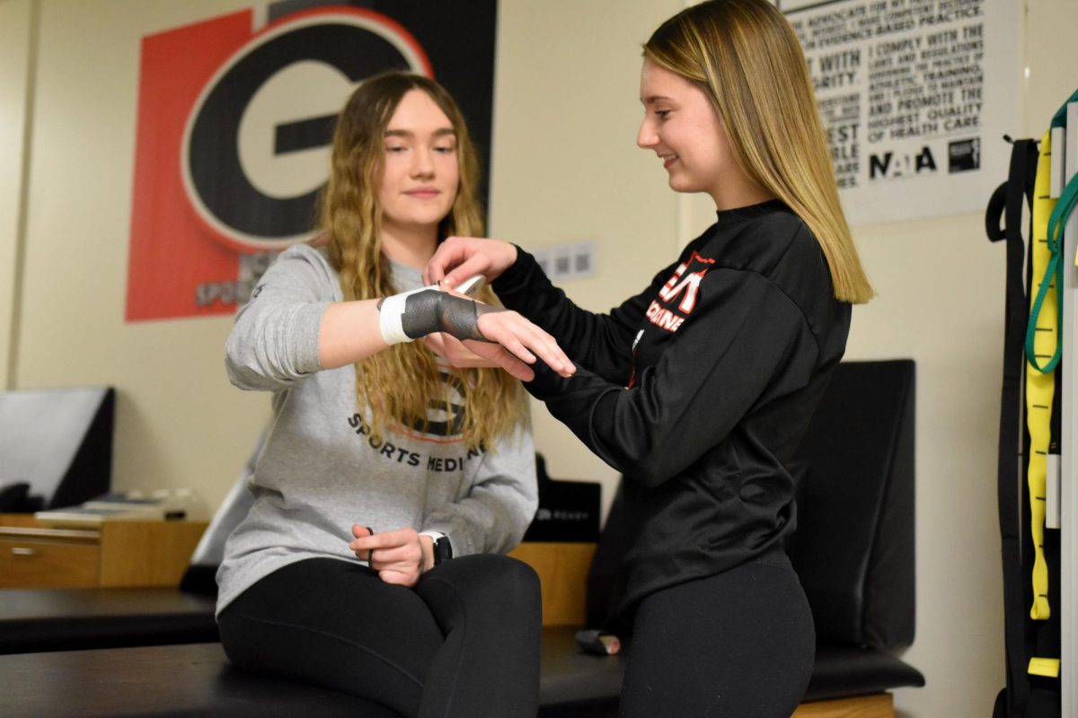 Going to the athletic trainers before or after a match or practice is a great way for people to get help. This can be through things like stretching, taping, or icing. The athletic trainers are always ready to help athletes. 